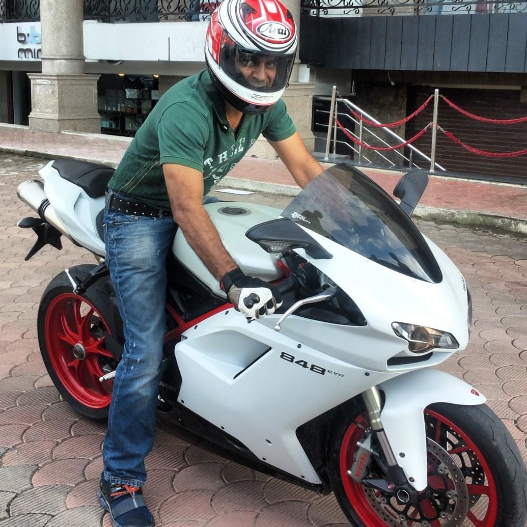 Akram Khan with his Ducati motorcycle